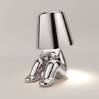 Goldene Tischlampe – Kreatives Figurendesign | Dekorative Wohnraumleuchte