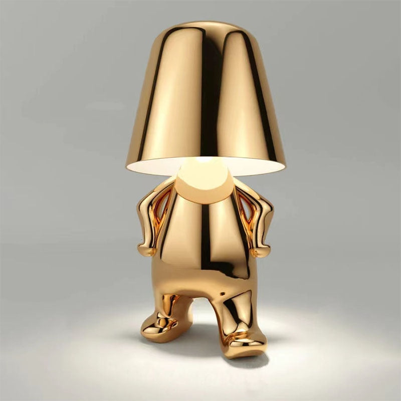 Goldene Tischlampe – Kreatives Figurendesign | Dekorative Wohnraumleuchte