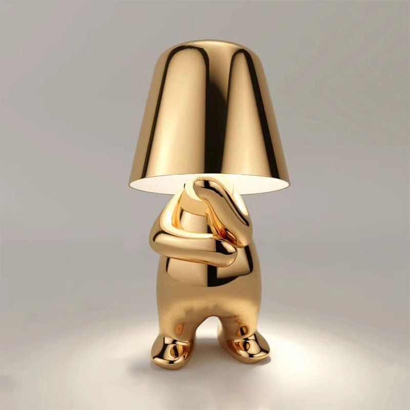 Goldene Tischlampe – Kreatives Figurendesign | Dekorative Wohnraumleuchte